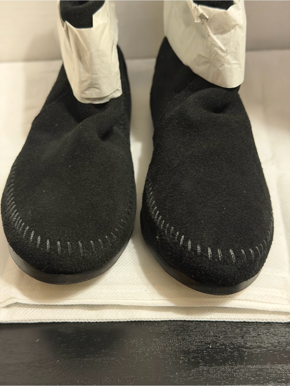 Minnetonka womens Black Suede Slip-On Moccasin ankle boots.